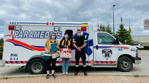 The La Ronge Public Health and La Ronge EMS Paramedics providing a mobile vaccination clinic. 