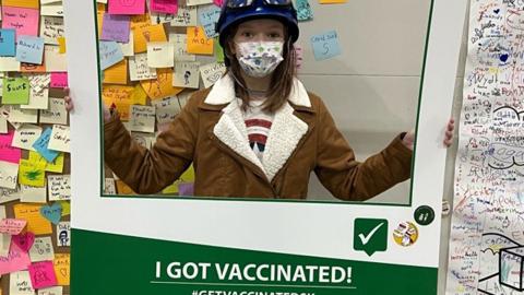 It’s official! Morgan MacFarlane poses after getting vaccinated.