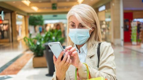 masked woman shopping
