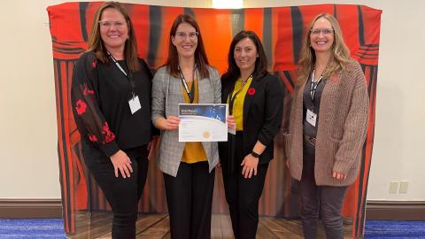 Regina team receiving their award