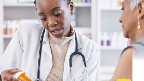 Pharmacist with patient.