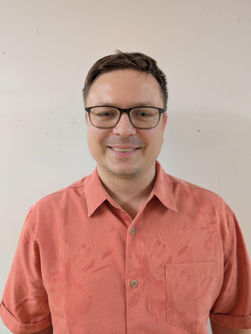 Headshot of Travis Runn