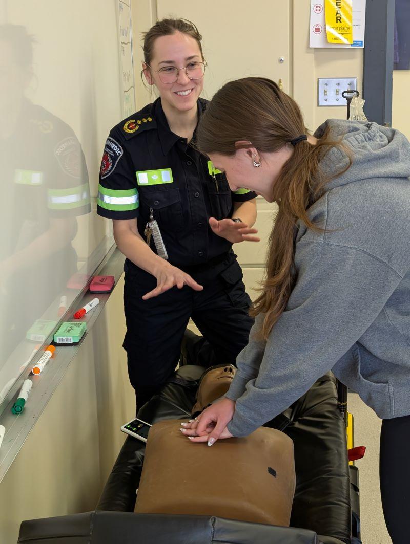 High School student interacts with EMS personnel
